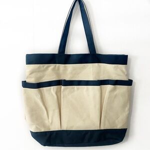 Leed’s Cream and Navy Pocket Tote Bag